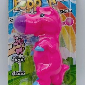 Squeeze Popper Unicorn Shoots 20 feet. Soft Foam Shooter